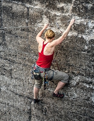 Woman rock climbing