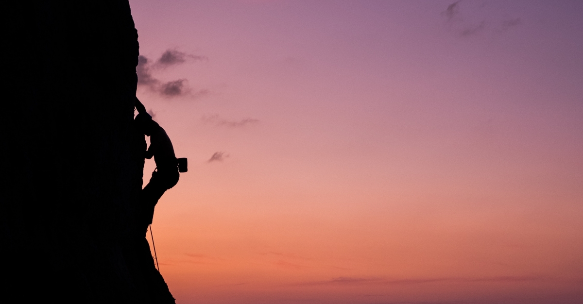 Rock climber at sunset