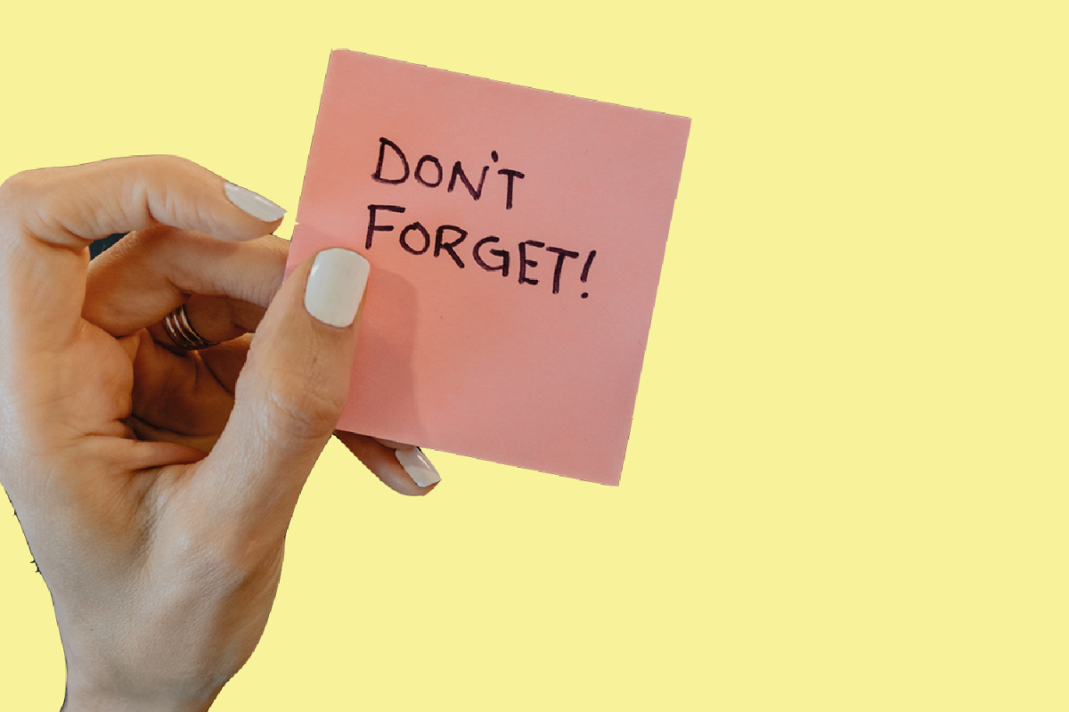 Hand with the note 'Don't forget'.