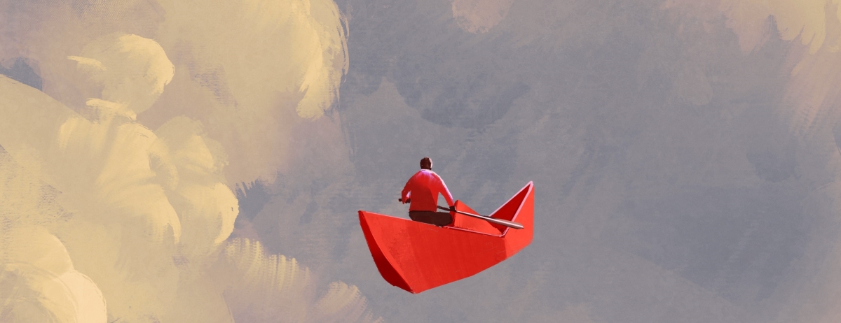 Paddling on paper boat in the clouds
