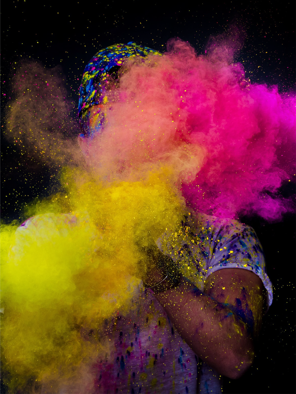 Coloured powder over a person.