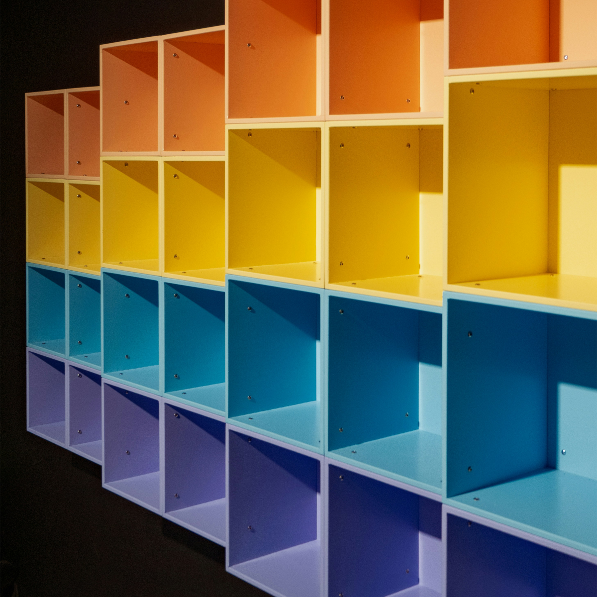 Blocks stacked together in rainbow colours.