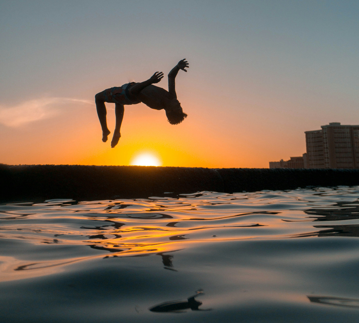 Person flipping into the ocean.