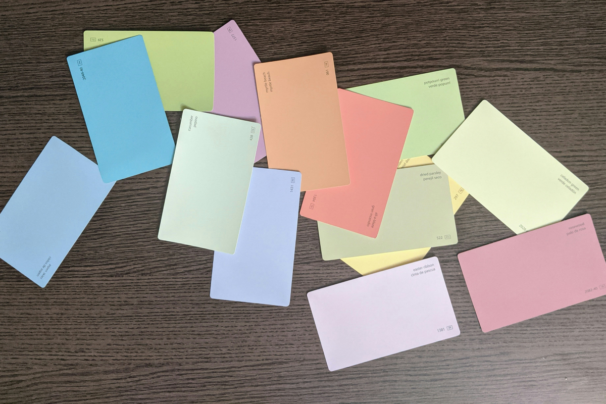 Pastel coloured cards on the table.