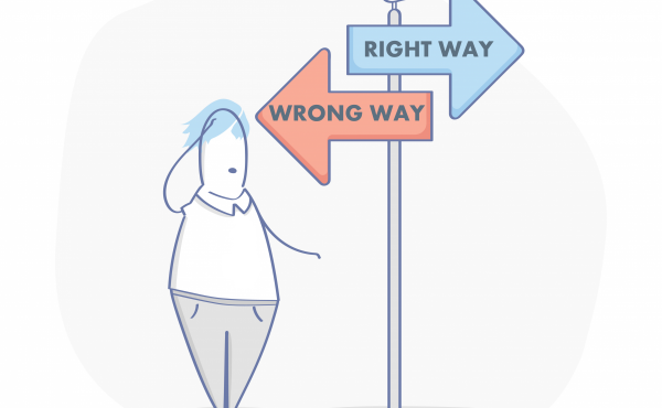 Person looking at a sign with two arrows: right way and wrong way