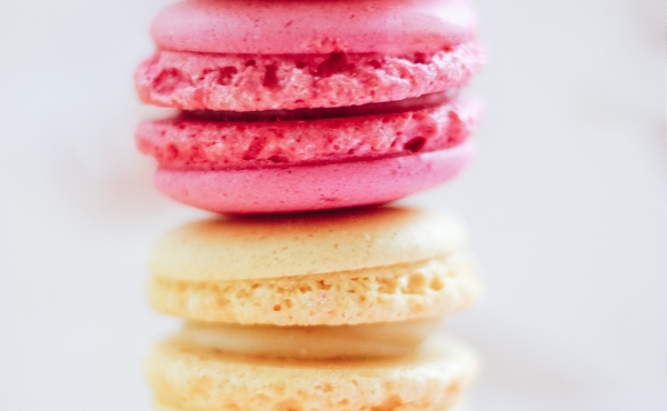 Stack of pink and yellow macarons