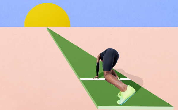 Athlete crouching down before running a race.