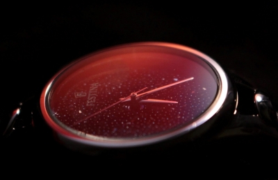 A watch face with an analogue dial