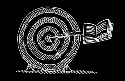Archery target with a book at one end of the arrow