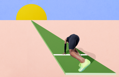 Athlete crouching down before running a race.